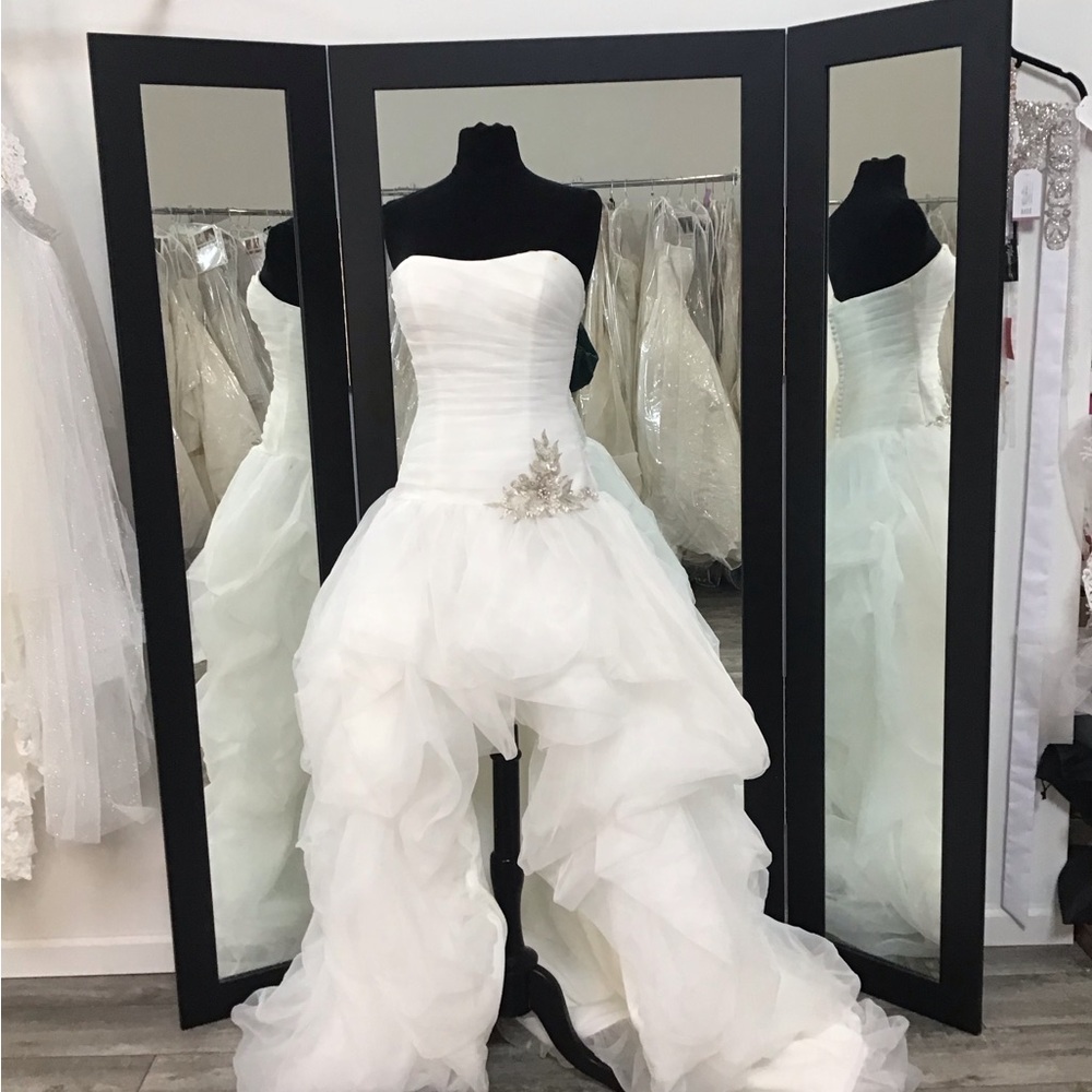 Strapless White Ballgown with Ruffled Skirt and Side Applique